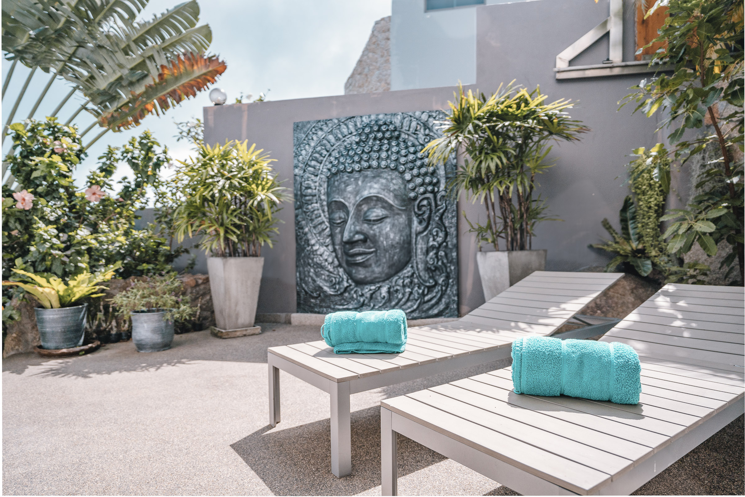 Pool deck with sun loungers